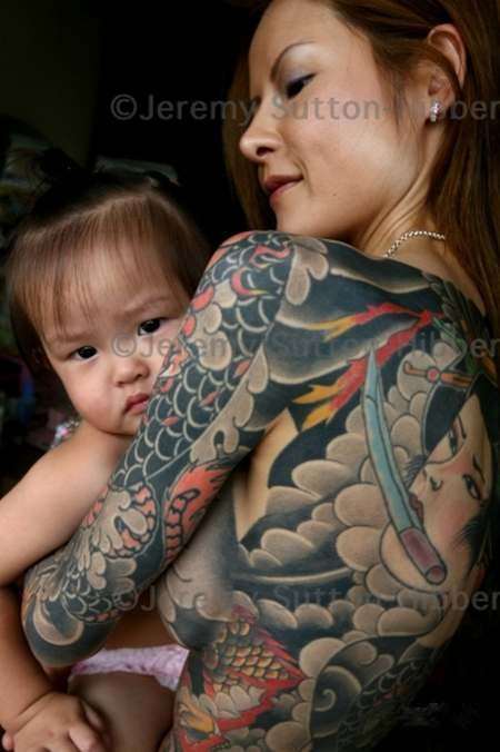 Yakuza have for centuries used extensive tattoos as a sign of 